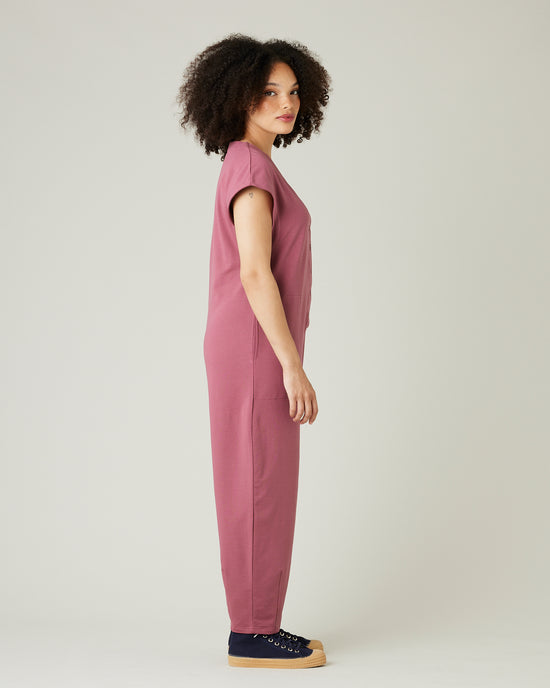 model wears autumn rose jersey frankie jumpsuit