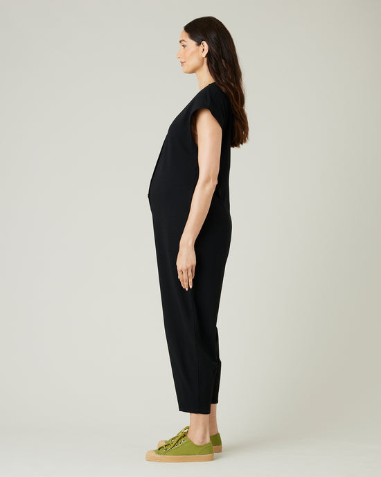 pregnant model wears black jersey frankie jumpsuit