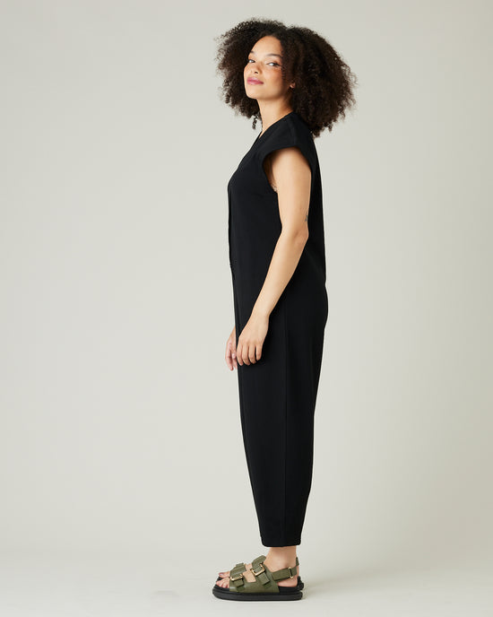 model wears black jersey frankie jumpsuit