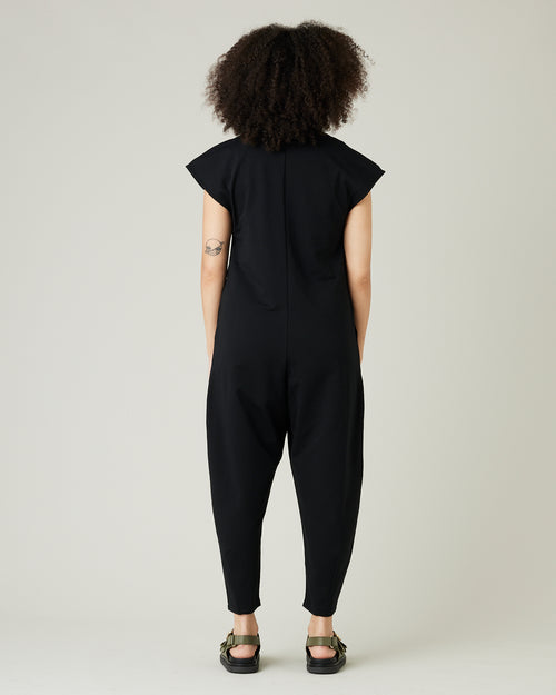 model wears black jersey frankie jumpsuit