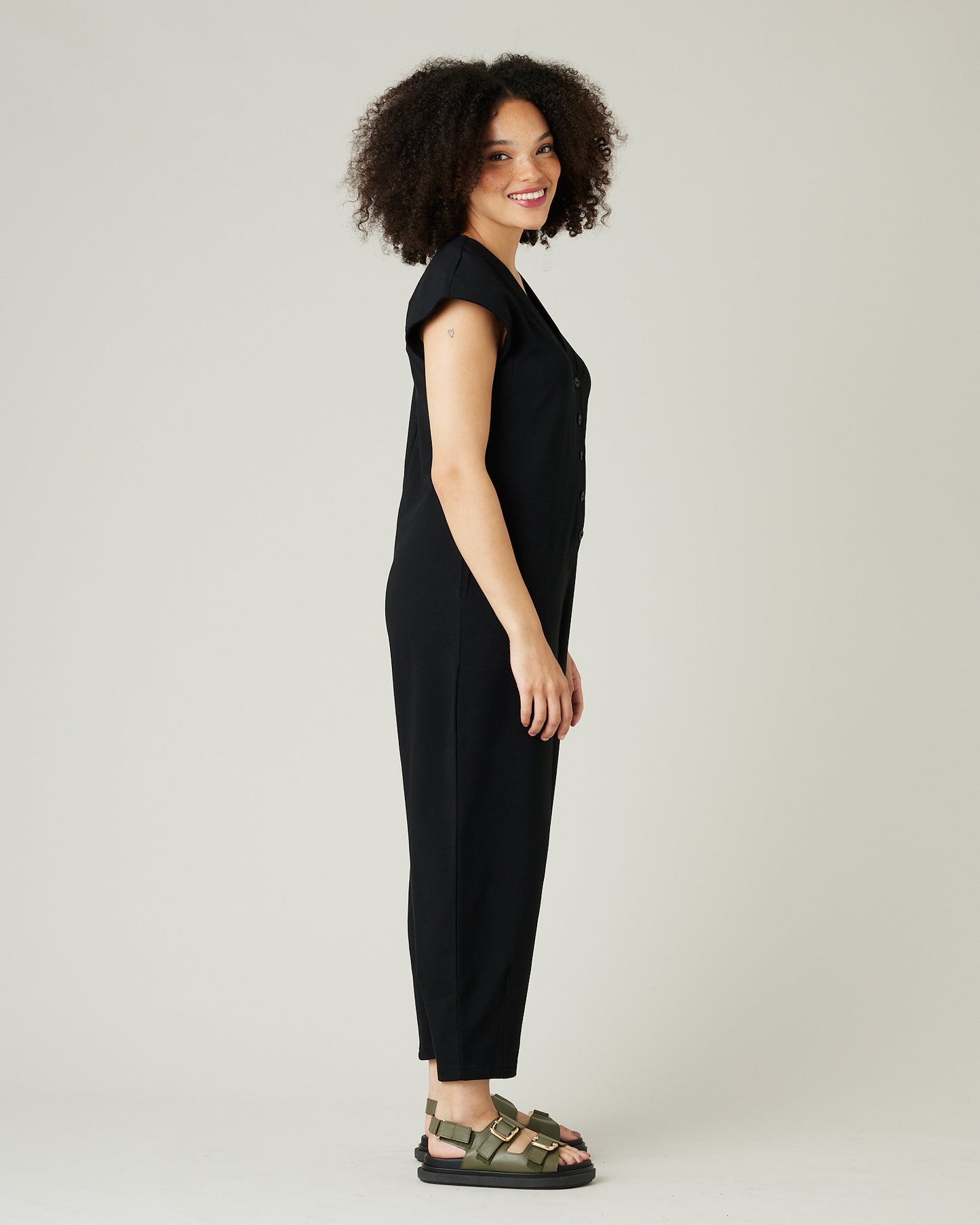 model wears black jersey frankie jumpsuit