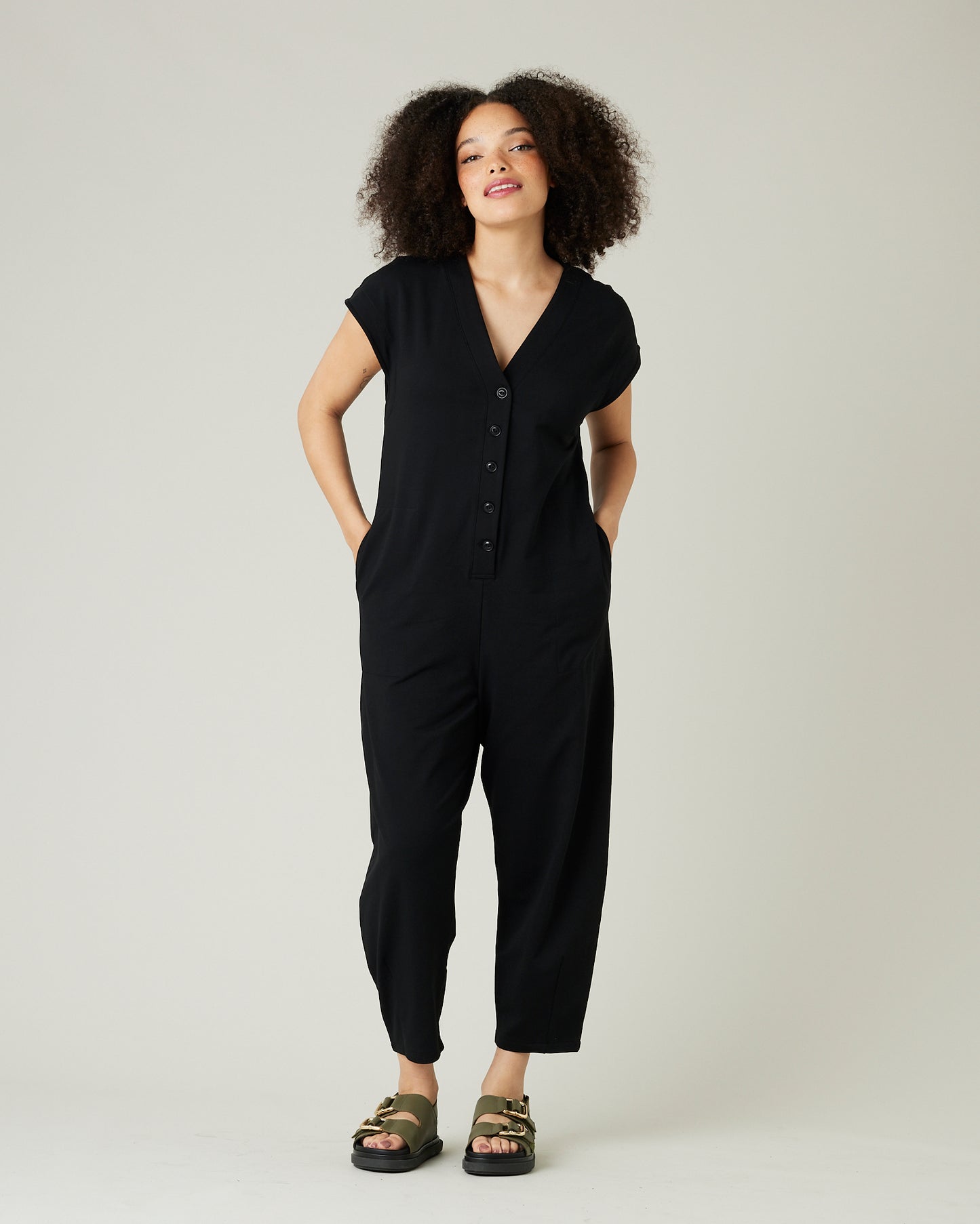 model wears black jersey frankie jumpsuit