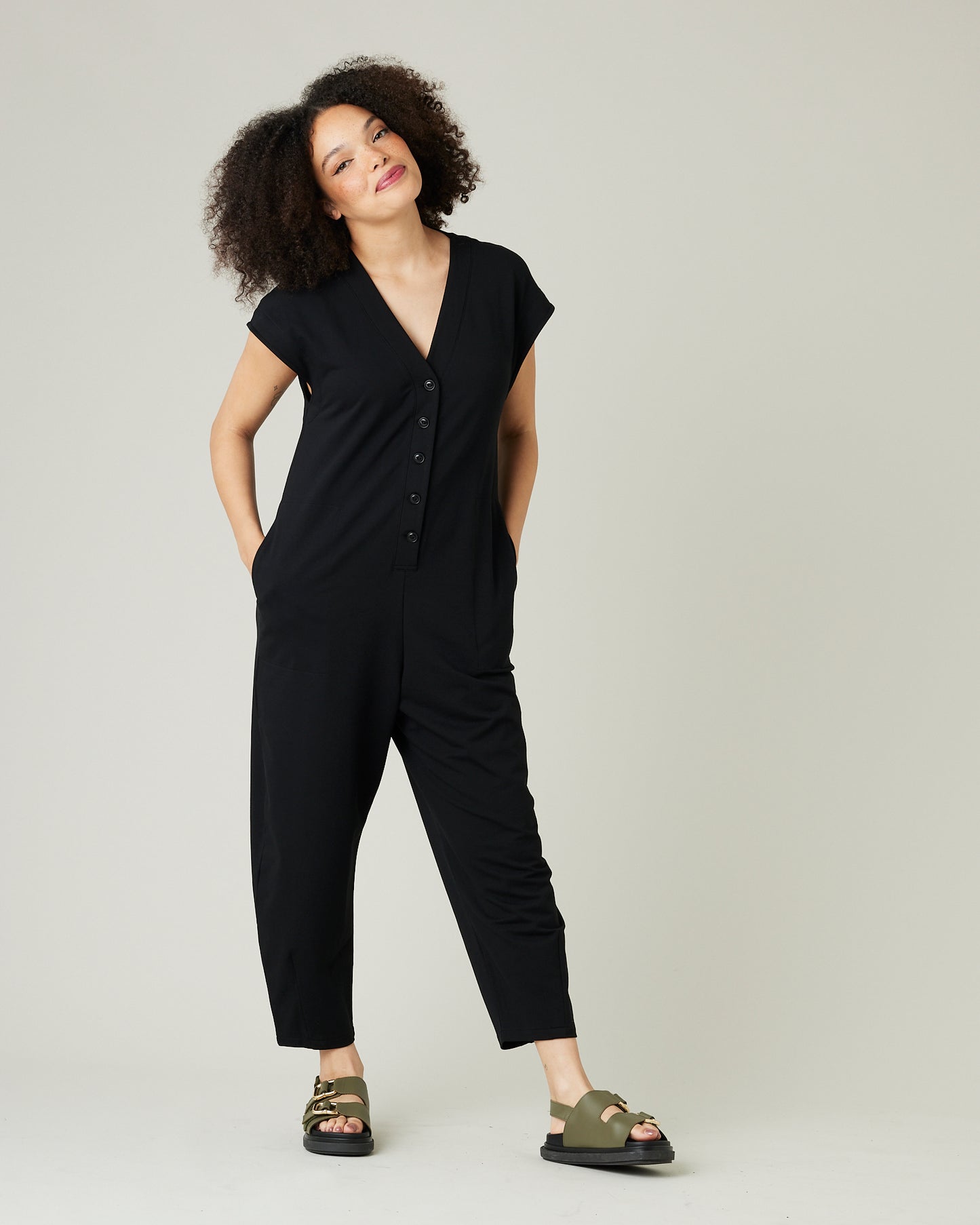 model wears black jersey frankie jumpsuit