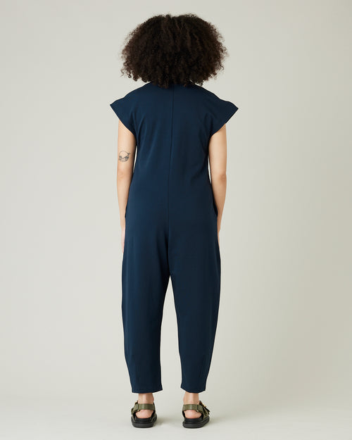 model wears navy jersey frankie jumpsuit