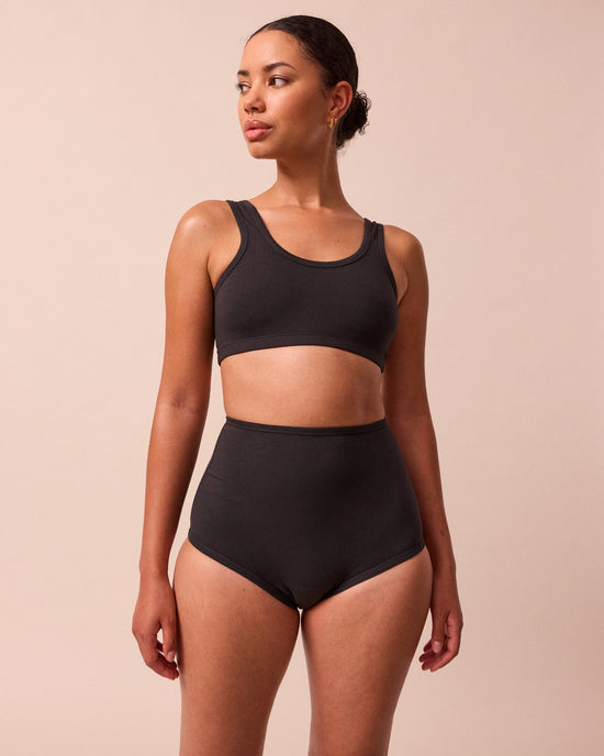 model wears black jersey bralette