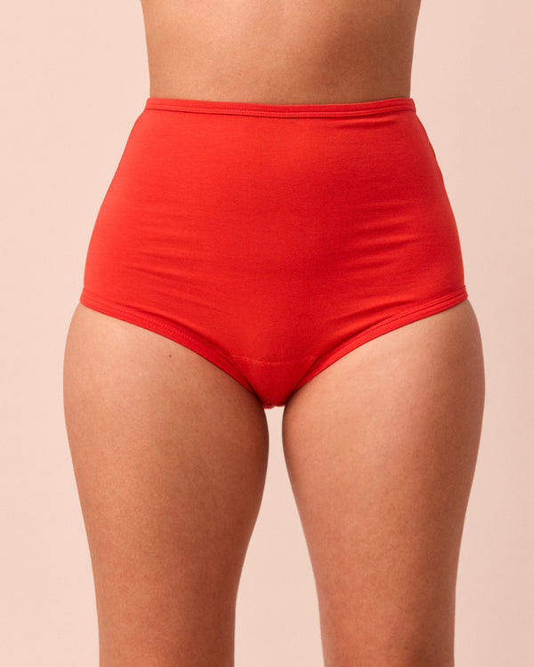model wears tomato red full coverage jersey knicker