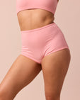 model wears petal pink full coverage jersey knicker