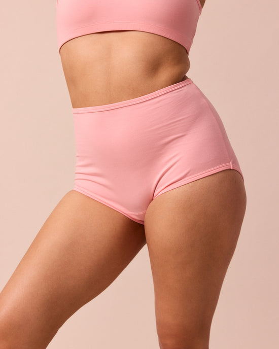 model wears petal pink full coverage jersey knicker