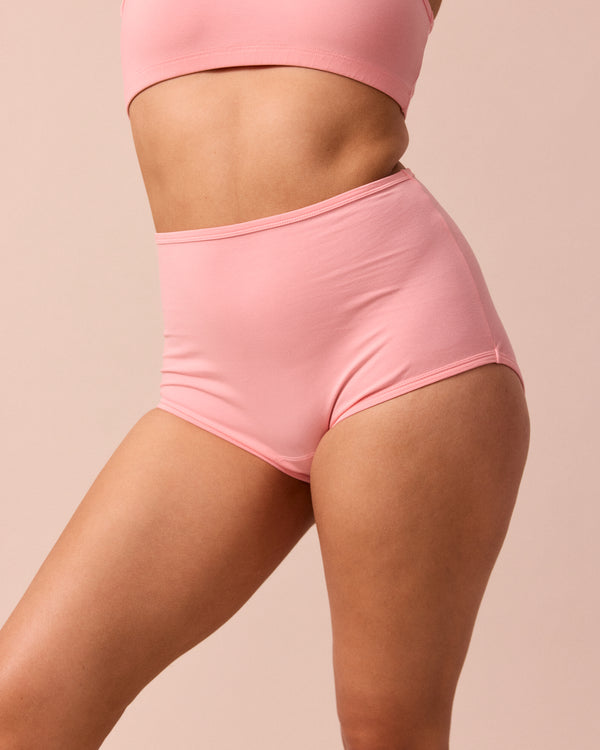 model wears petal pink full coverage jersey knicker