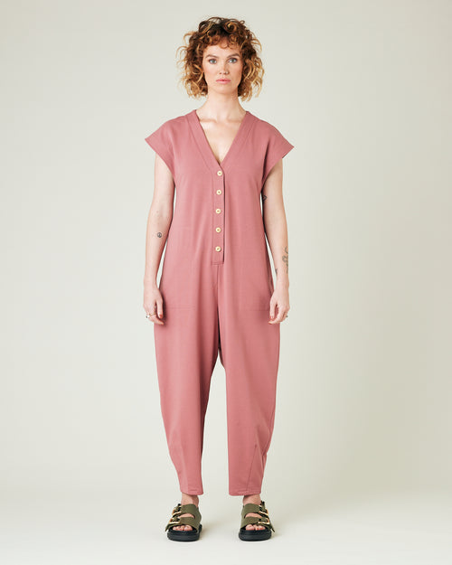 model wears dusty pink jersey frankie jumpsuit