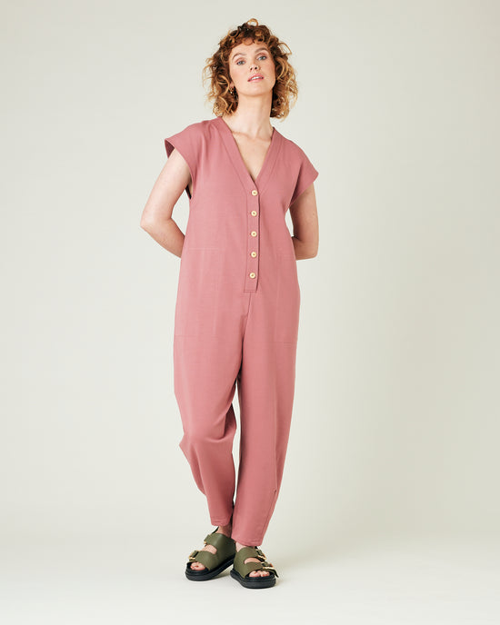 model wears dusty pink jersey frankie jumpsuit