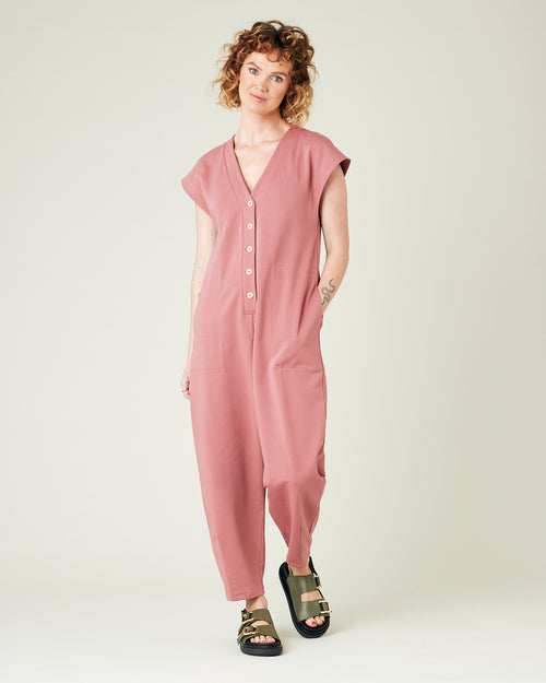 model wears dusty pink jersey frankie jumpsuit