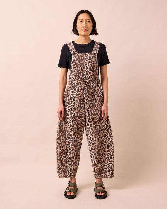 model wears gwynne leopard print denim dungarees