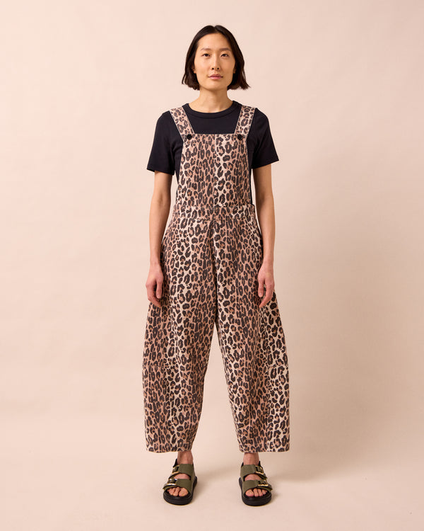 model wears gwynne leopard print denim dungarees