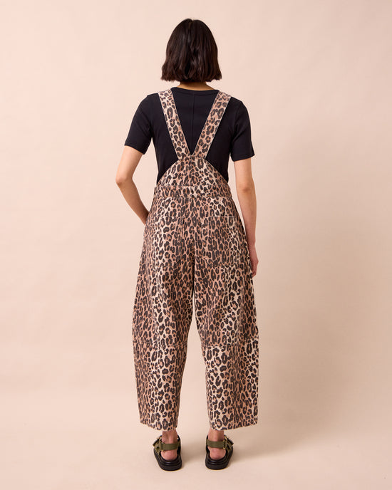 model wears gwynne leopard print denim dungarees