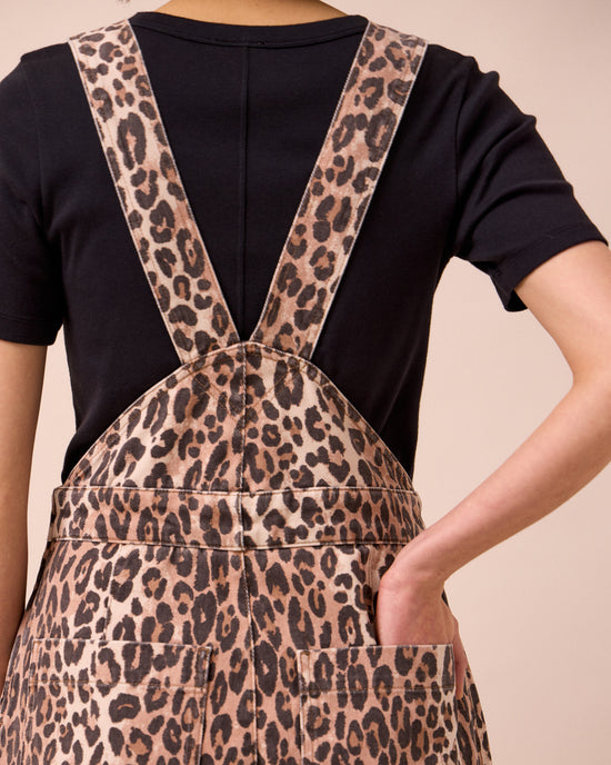 model wears gwynne leopard print denim dungarees