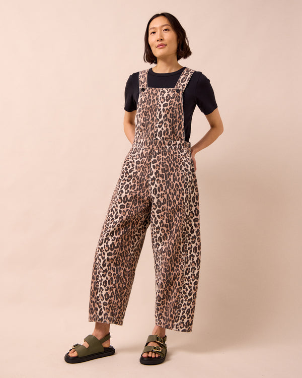 model wears gwynne leopard print denim dungarees