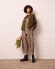 model wears rosa olive denim jacket