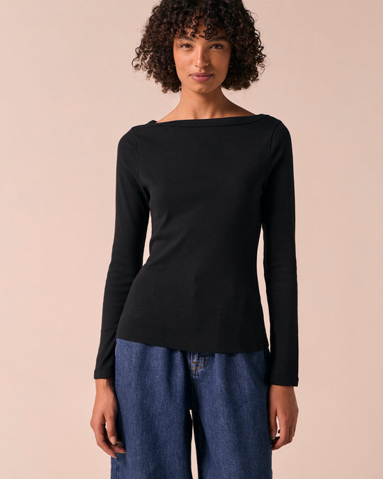 model wears havana black jersey top