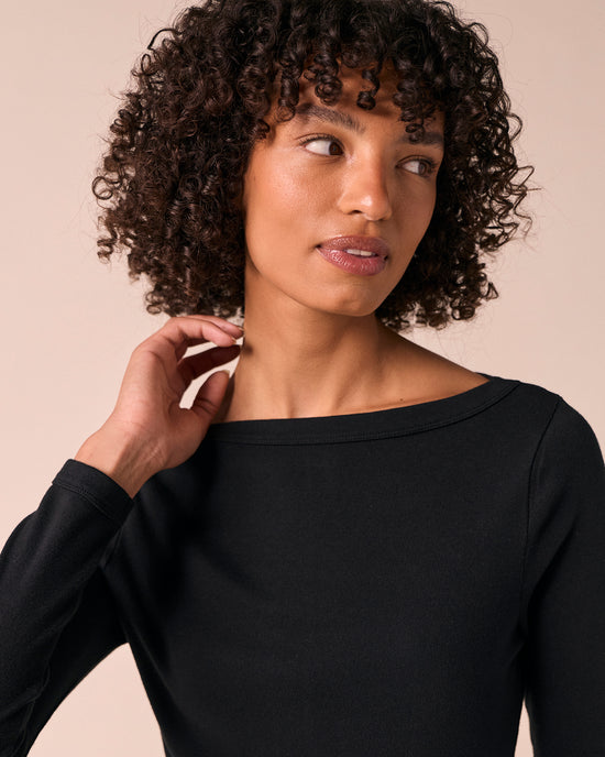 model wears havana black jersey top