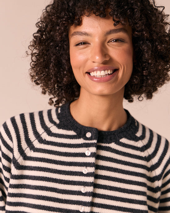 model wears henna charcoal stripe knitted cardigan