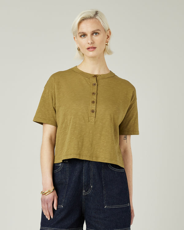 model wears khaki henri top 