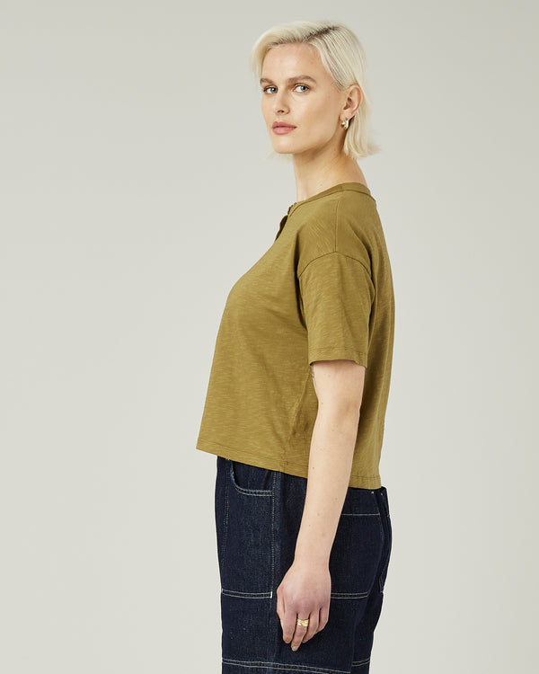 model wears khaki henri top 