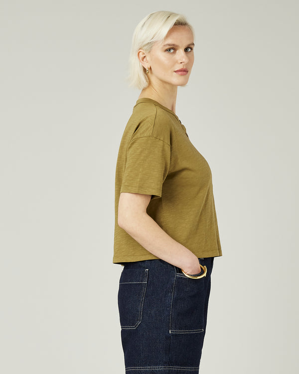 model wears khaki henri top 
