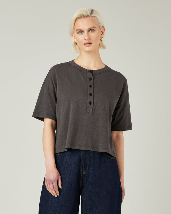 model wears slate henri tee