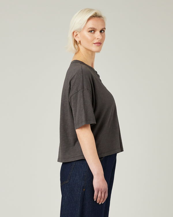 model wears slate henri tee
