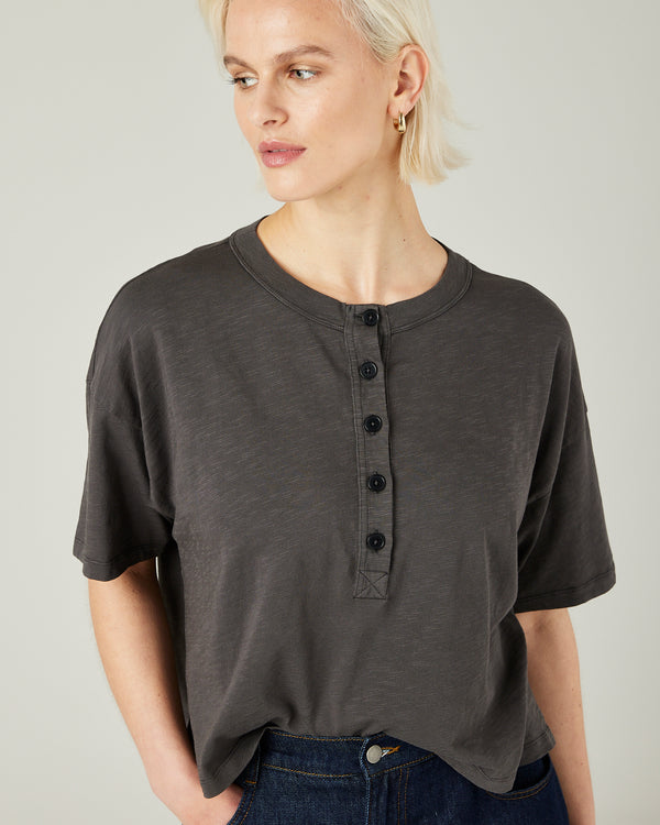 model wears slate henri tee