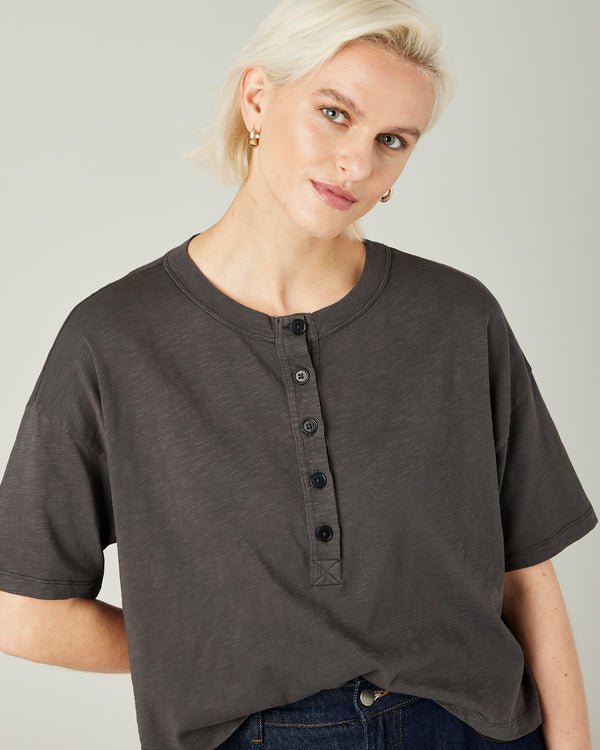 model wears slate henri tee