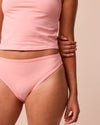 model wears petal pink high rise jersey knickers