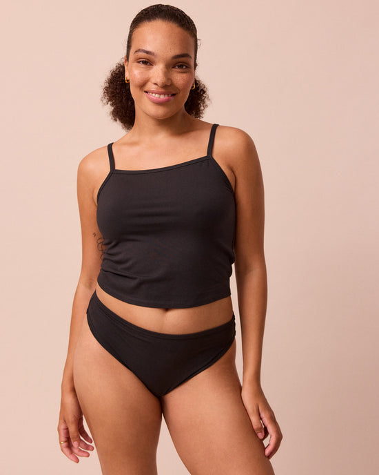 model wears black high rose jersey knicker