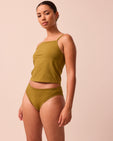 model wears golden olive high rise jersey knicker