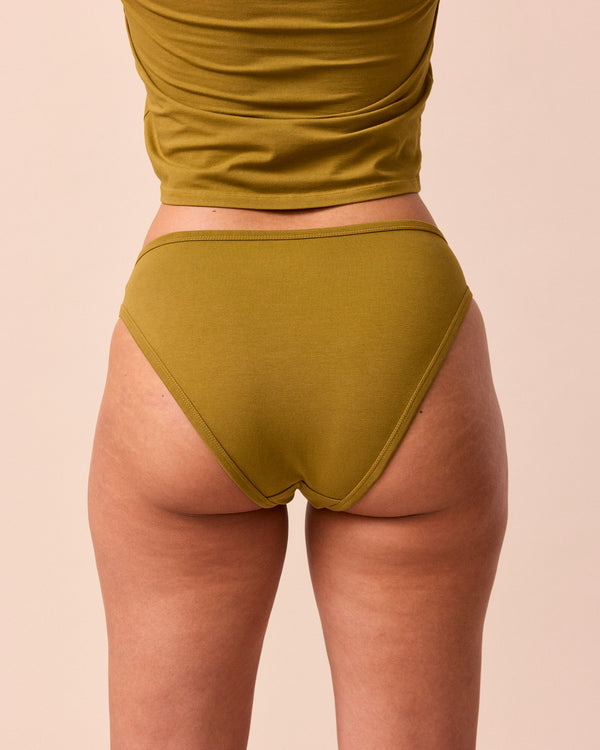 model wears golden olive high rise jersey knicker