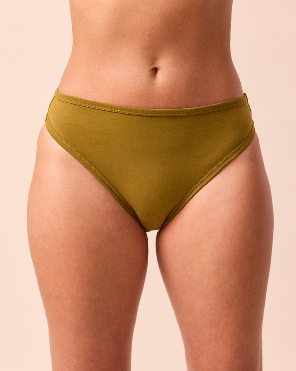 model wears golden olive high rise jersey knicker