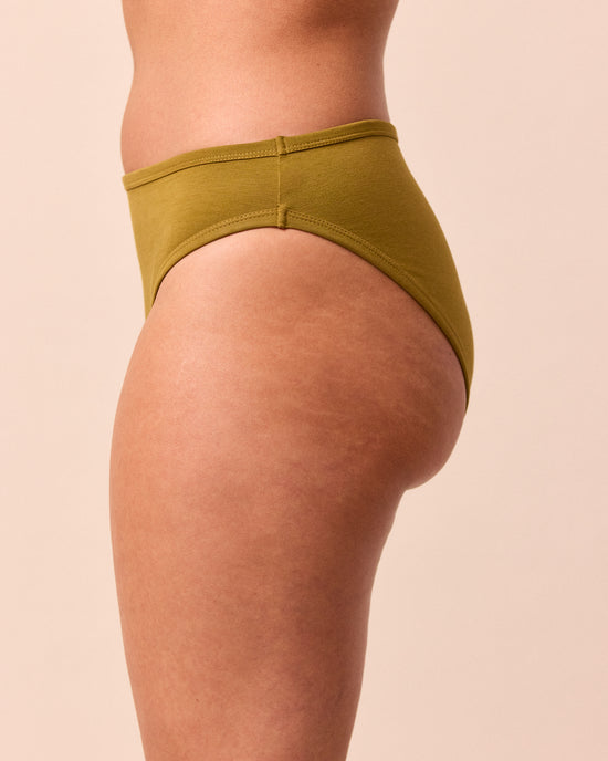 model wears golden olive high rise jersey knicker
