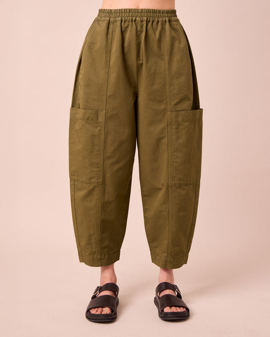 model wears hilda khaki cotton linen trousers front