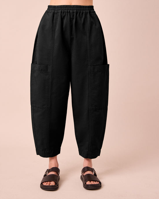 model wears hilda black cotton linen slub trousers front
