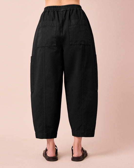 model wears hilda black cotton linen slub trousers back
