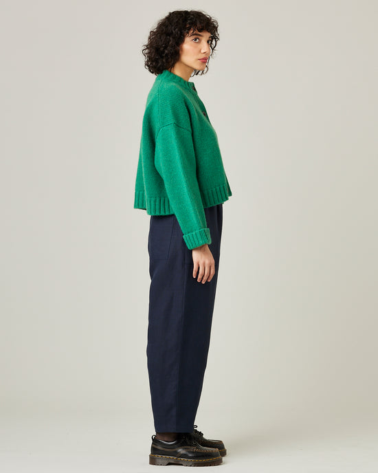 model wears navy huxley linen trousers 