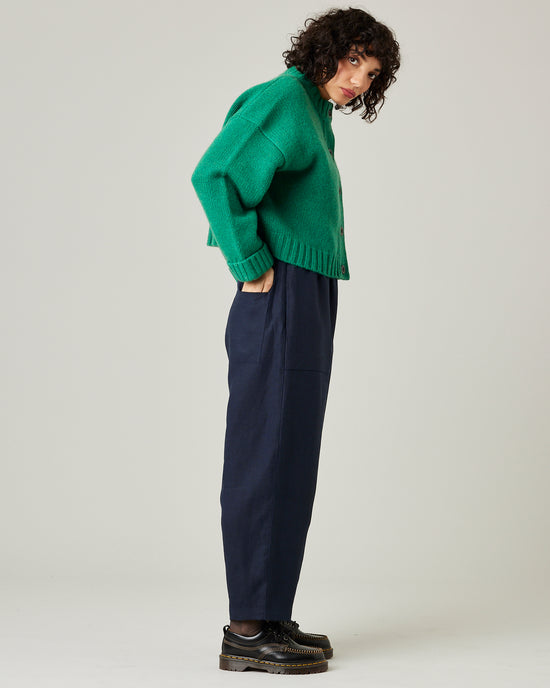 model wears navy huxley linen trousers 