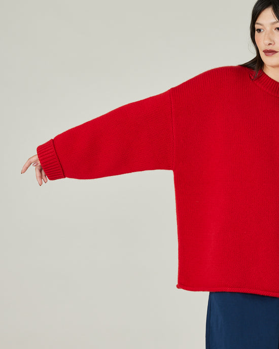 model wears red knitted luna jumper