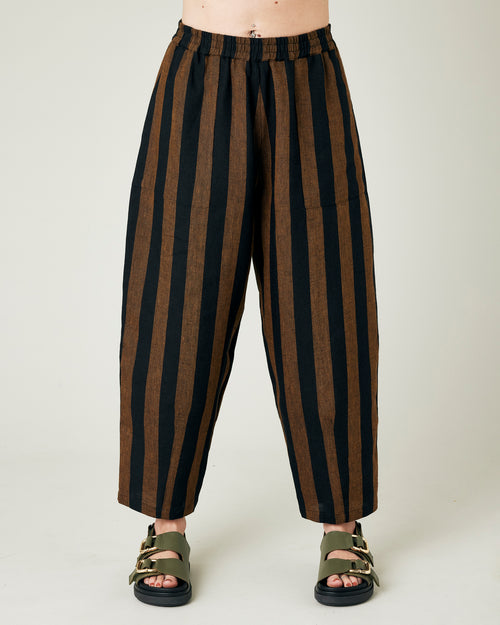 model wears longer length rust stripe huxley trousers front