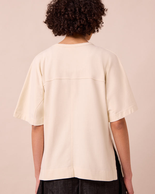 model wears irena bone jersey top