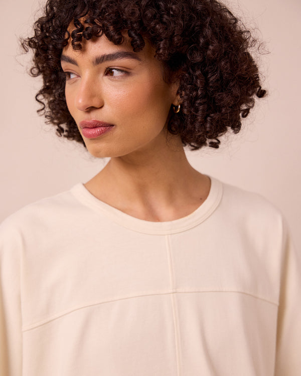 model wears irena bone jersey top