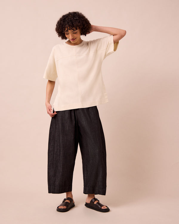 model wears irena bone jersey top