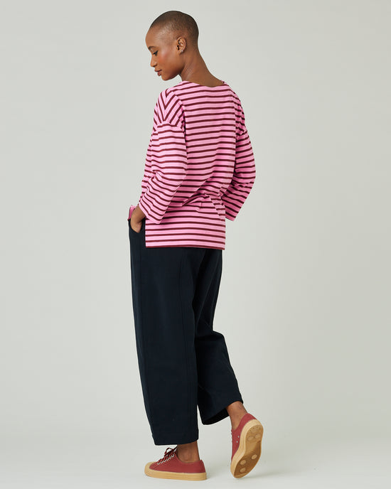 model wears pink and cherry breton 