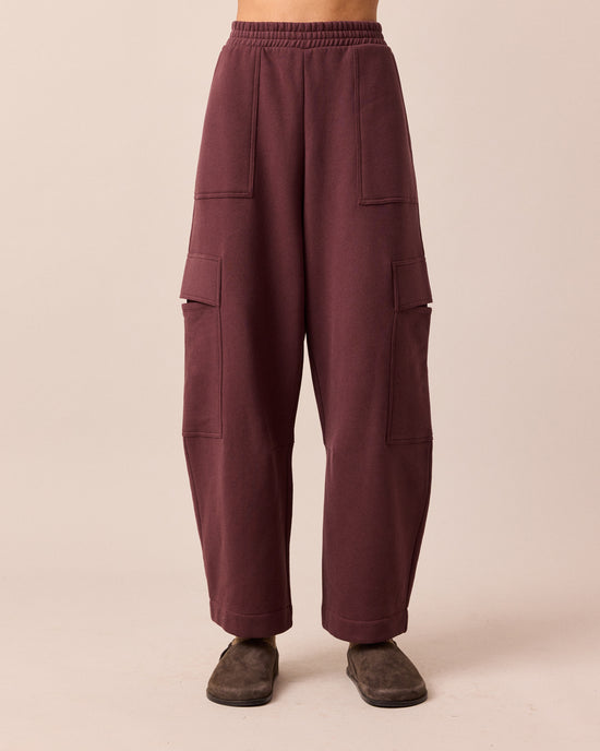 model wears jessie burgundy jersey trouesrs front